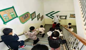 E:\惠自霞\炮幼总目录\2023-2024第二学期\2023-2024第二学期--网站新闻\消防演练照片2024.3.6\QQ图片20240306150657.jpg